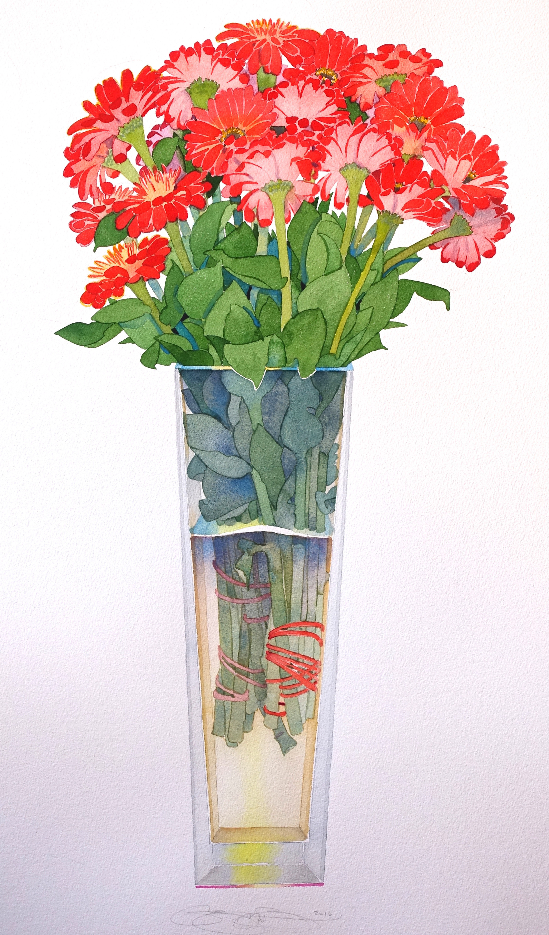 Zinnias in a tall vase
